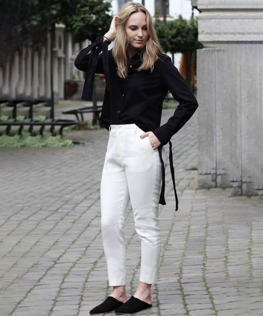 White pants black shirt 2024 outfit