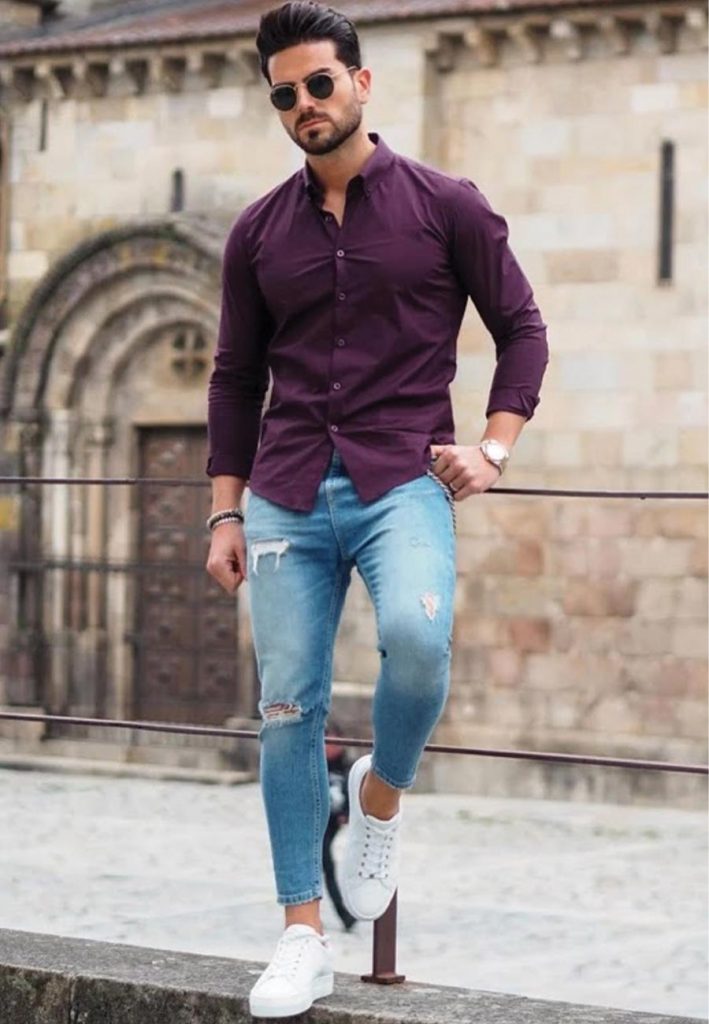 Blue jeans matching purple shirt